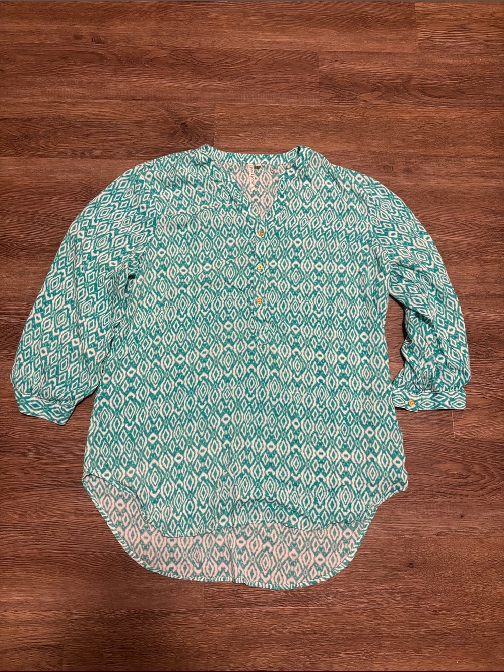 women’s green and white blouse